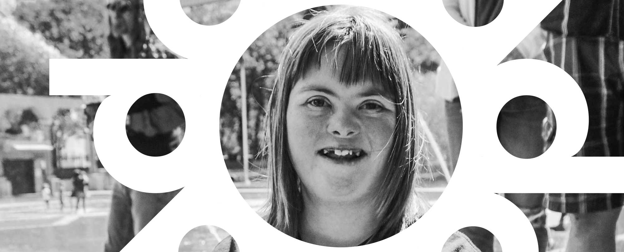 Smiling girl with DwP logo overlay. | Disability Without Poverty